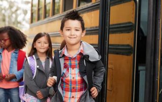 Children waiting for the bus for daycare in Attleboro, MA