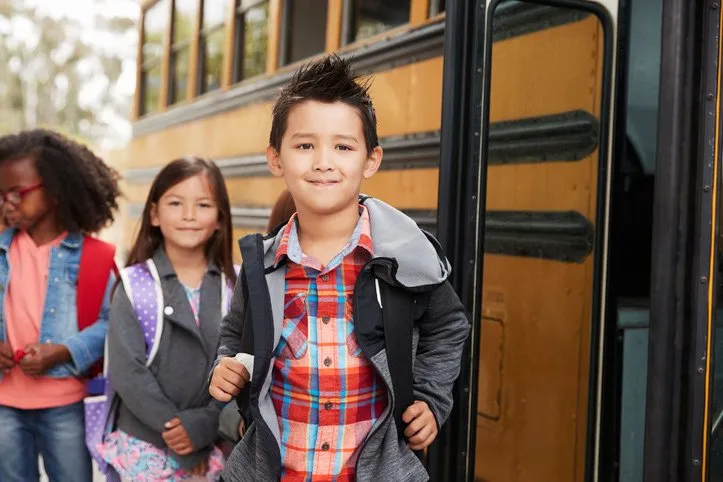 Children waiting for the bus for daycare in Attleboro, MA